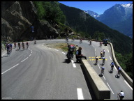 Etape riders rounding the most scenic Alpe d'Huez switchback.jpg