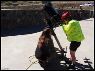 The microsopic master checking out a telescopic view of a sun spot.jpg