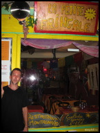We had a great post ride meal; the owner standing in front of his cool establishment.jpg