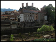 Old decaying buildings lining the Ariege River.jpg