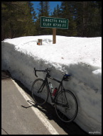 At the top, a mostly buried Ebbetts Pass sign belies the warm temperature.jpg