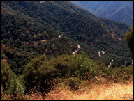From Amphitheater Point, Generals Highway cutting through chaparral and oak-studded foothills.jpg