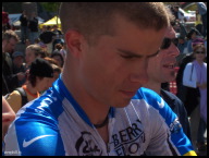 Crowd favorite, Michael Creed concentrating while guiding his bike through the crowds.jpg